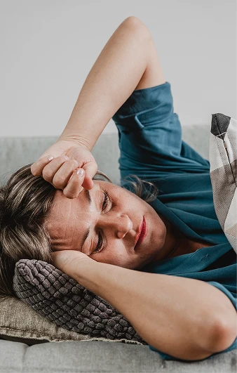 A woman lying down for a quiet break
