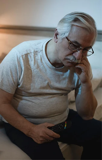 A man resting on the sofa after a long day